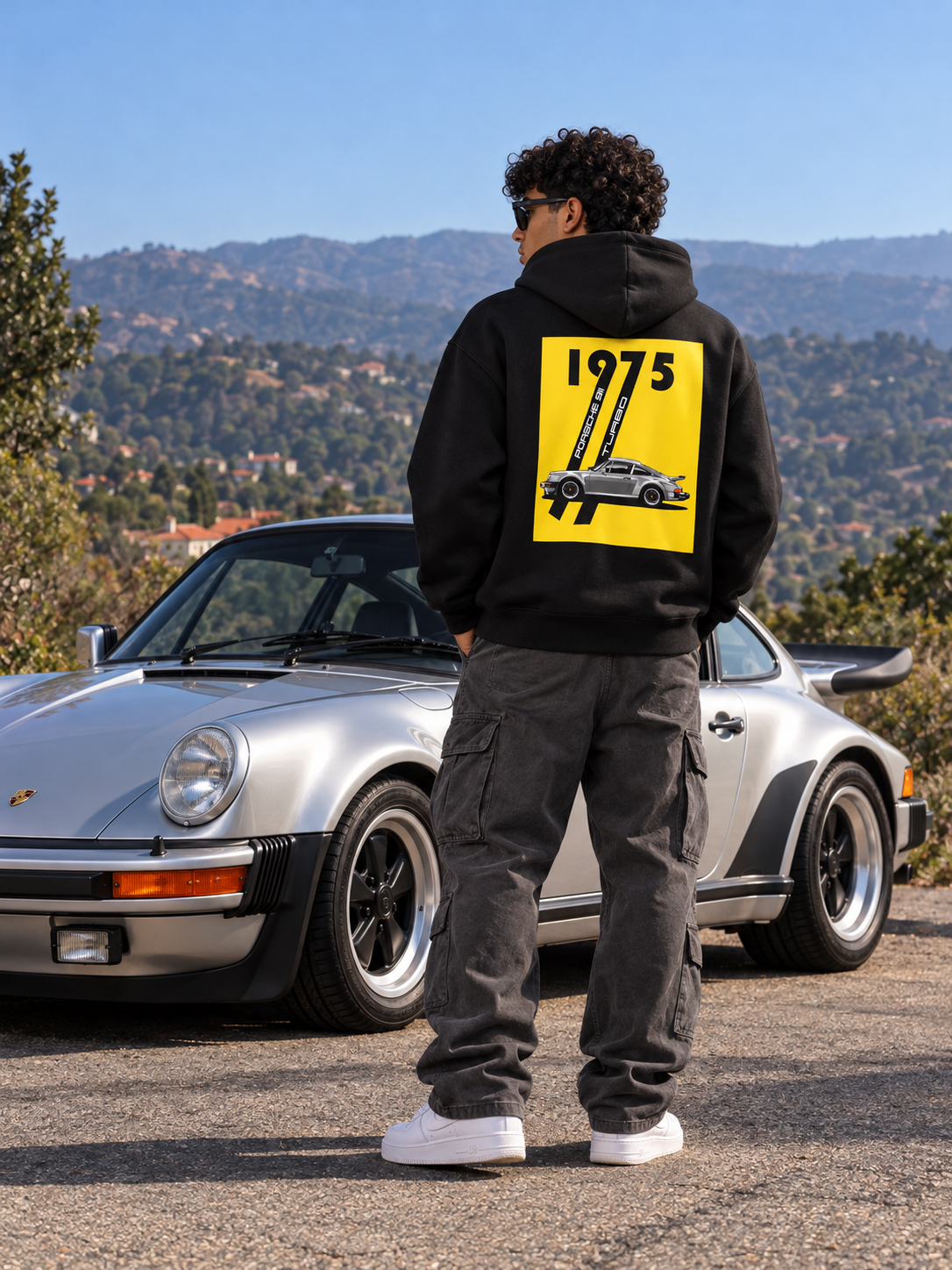 1975 Porsche hoodie worn with classic silver Porsche